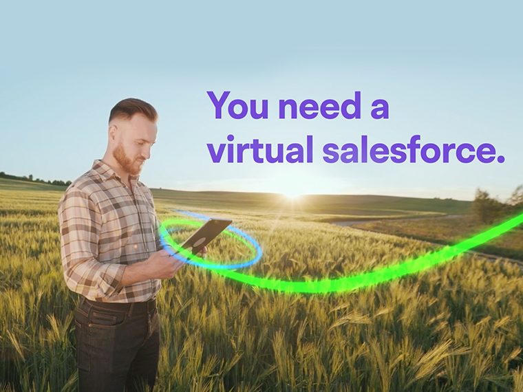 grower in field with sunrise holding smartphone with statement of - you need a virtual salesforce
